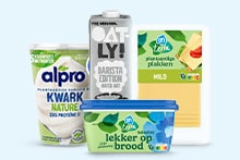 Plantaardige producten van Alpro, Oatly en Albert Heijn, waaronder plantaardige kwark, haverdrink, margarine en plakjes kaas.