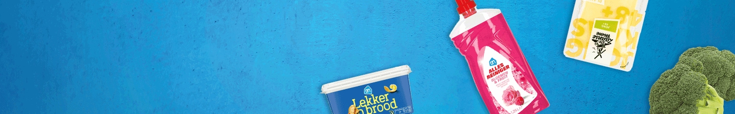 Producten van Albert Heijn voor zorginstellingen, waaronder AH Lekkerbrood, Allesreiniger en broccoli op een blauwe achtergrond.