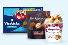 Drie diepvriesproducten: Iglo vissticks, Kwekkeboom oven bitterballen en Häagen-Dazs Macadamia Nut Brittle ijs.