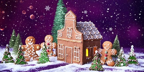 Peperkoekhuisje met versierde peperkoekfiguren en kerstboompjes in een winters landschap