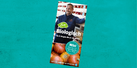 Promotieposter van Albert Heijn voor biologische producten met een kans om een tas vol biologische boodschappen te winnen ter waarde van 50 euro.