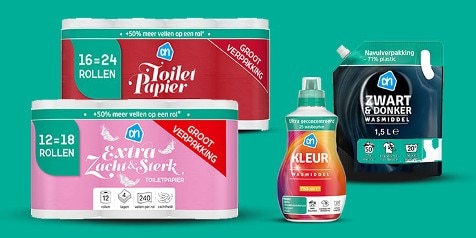 Albert Heijn grootverpakkingen van toiletpapier en wasmiddel in verschillende varianten, waaronder "Extra Zacht & Sterk" toiletpapier, "Kleur" wasmiddel en "Zwart & Donker" wasmiddel in navulverpakking.