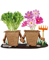 Groentepot en bloempot met hand in hand en hark op de achtergrond