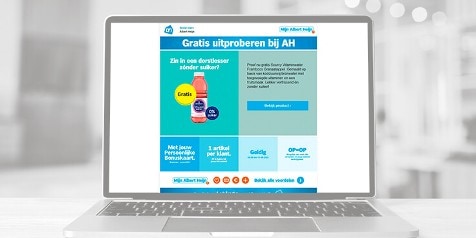 Promotie van gratis Sourcy Vitaminwater op een laptop, beschikbaar bij Albert Heijn.