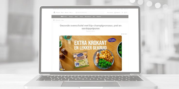 Calvé promotie voor krokante en gekruide gerechten op een laptop scherm.