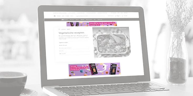 Website van Albert Heijn met vegetarische recepten en advertentie voor Etos Mijn Moment chocoladerepen.