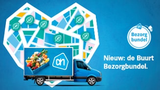 Afbeelding van een blauwe Albert Heijn bezorgwagen voor een hartvormige plattegrond met AH-punten, promoot de nieuwe Buurt Bezorgbundel.