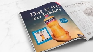 Advertentie voor Rivella drank met 50% kortingscoupon in een tijdschrift.