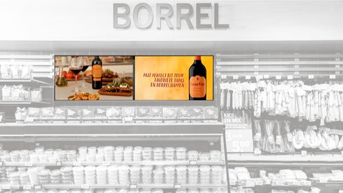 Reclame van Campo Viejo wijn in een Albert Heijn winkel, gelegen in de borrelhapjes sectie.