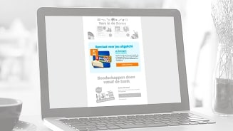 Promotie van L'OR koffiecapsules op een laptop scherm