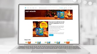 Lay's winactie pagina met kans om een bol.com cadeaukaart te winnen ter waarde van 30 euro, op een laptop scherm.