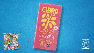 Reep CLARO pure chocolade 85% cacao, biologisch, uit Colombia, met Fairtrade- en B Corp-certificering op blauwe achtergrond.