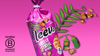 Zak Leev Lovely Lentil Natural brood op een roze achtergrond met linzentak illustratie en B Corp certificering logo