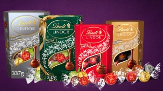 Lindt Lindor chocoladetruffels in verschillende smaken en verpakkingen tegen een paarse achtergrond
