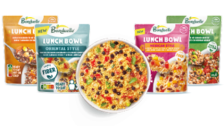 Verschillende Bonduelle Lunch Bowl maaltijden in verpakkingen, met in het midden een kom gevuld met een kleurrijke lunchmaaltijd.