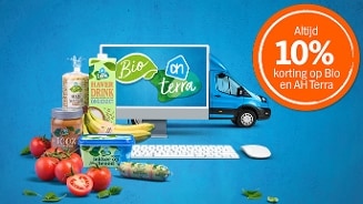 Promotie voor 10% korting op AH Biologisch en AH Terra producten met computer en bestelwagen op de achtergrond, inclusief diverse biologische producten.