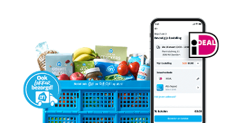 Albert Heijn bezorgkrat vol met boodschappen en een telefoon scherm met iDEAL betaalscherm.