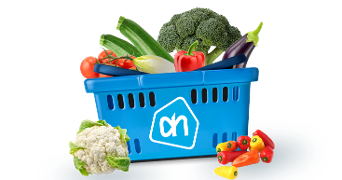 Albert Heijn winkelmandje gevuld met diverse groenten zoals broccoli, paprika, courgette en bloemkool.