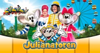 Groepsfoto van mascottes en mensen verkleed als entertainers voor de attracties van pretpark Juliana Toren, met op de achtergrond een achtbaan en een reuzenrad. In het midden staat het Juliana Toren-logo afgebeeld.