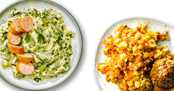 Boerenkoolstamppot met rookworst en hutspot met gehaktbal op twee borden