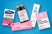 Producten voor zwangerschap en gezondheid, inclusief Davitamon Zwanger Compleet met Omega-3, Etos Foliumzuur Vitamine D3, Etos Ovulatietest en Albert Heijn Zwanger Dag Kalendersysteem.