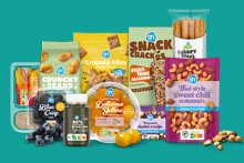 Lekkere en gezonde tussendoortjes zoals noten, snack crackers, crunchy beans, granola bites en druiven.