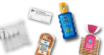 Verschillende producten, waaronder Nivea zonnebrandcrème, Etos Cinnarizine tablet, reisflesjes, verse rozenbollen en Albert Heijn roomboter stroopwafels.