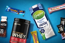 Verschillende proteïne- en eiwitrepen, proteïnepoeder, proteïnedrank en halfvolle melk met extra proteïne van onder andere Campina, Optimum Nutrition, Grenade, Barebells en melkunie.