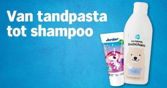 Tandpasta Jordan Kids 0-5 en AH beregoede badschuim met tekst "Van tandpasta tot shampoo" op een blauwe achtergrond.