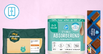 Zaanlander jong belegen kaas, AH sterk & absorberend keukenpapier en AH Zaanse huisje melk biscuits naast elkaar op een roze achtergrond