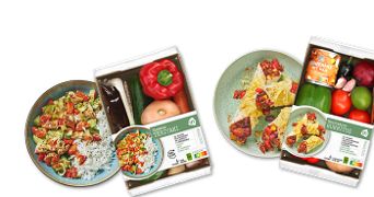 Albert Heijn maaltijdpakketten voor teriyaki en Mexicaanse burrito's met verse groenten zoals paprika, courgette en rijst.