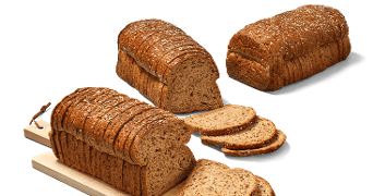 Volkorenbrood met gesneden plakken, deels gepresenteerd op een houten plank.