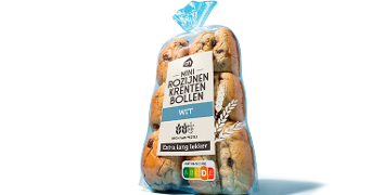Zak met Albert Heijn mini rozijnen krentenbollen wit, bron van vezels, met Nutri-score C.