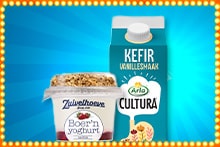 Twee zuivelproducten: een beker Zuivelhoeve Boer’n yoghurt met granola en een pak Arla Cultura kefir vanille.
