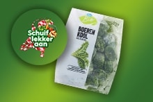 Zak biologische boerenkool met het logo "Schuif lekker aan" op groene achtergrond