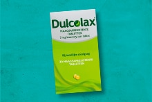 Verpakking Dulcolax maagtablet op een turquoise achtergrond