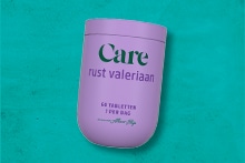 Potje Care Rust Valeriaan-tabletten op groene achtergrond