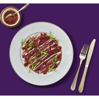 Een afbeelding van AH Greenfields Carpaccio crispy chili oil