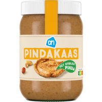 Een afbeelding van AH Pindakaas met stukjes pinda