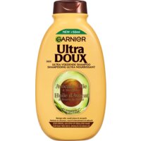 Een afbeelding van Ultra Doux Shampoo avocado olie & shea boter bel