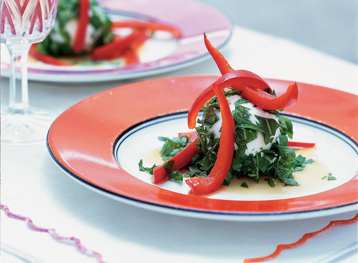 Paprika in gembersaus op geitenkaas