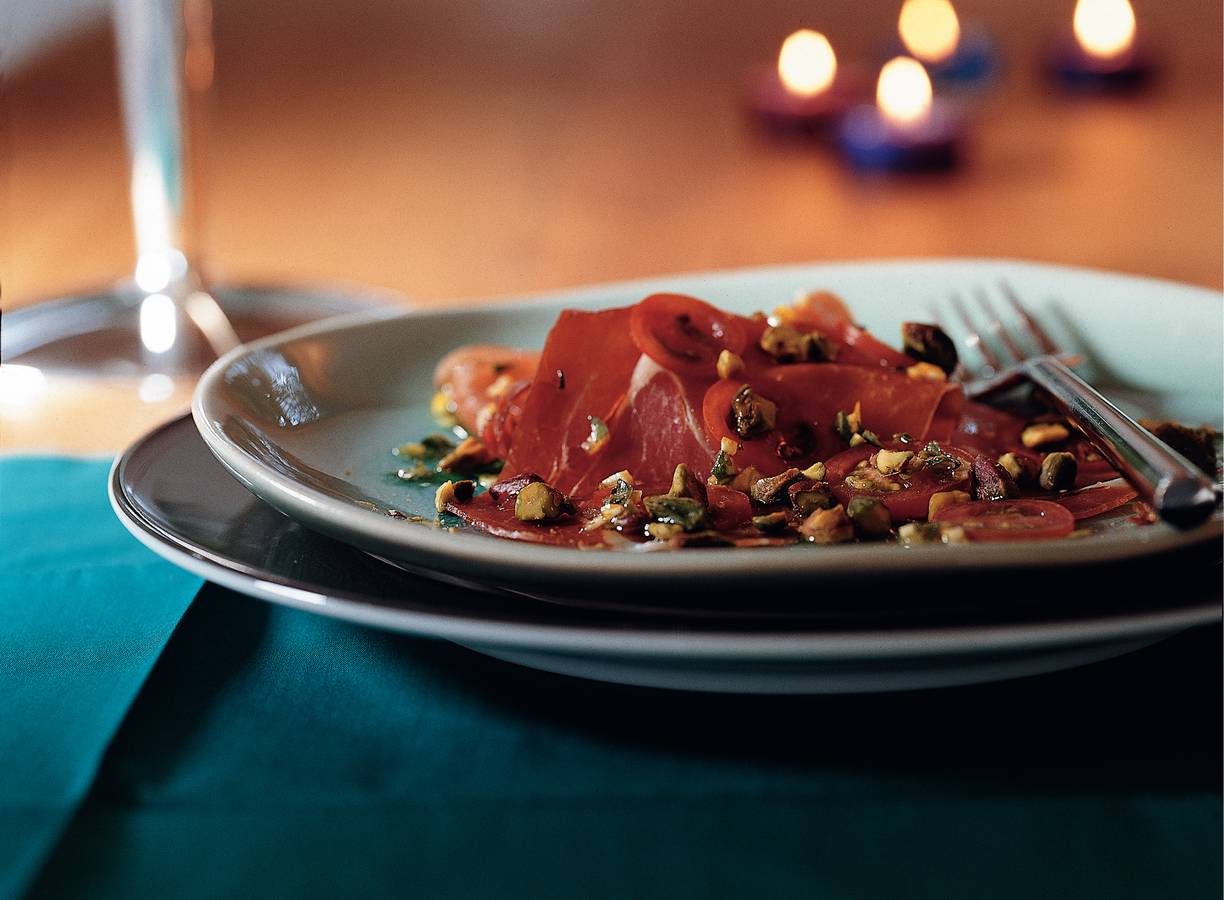 Carpaccio van serranoham en tomaat