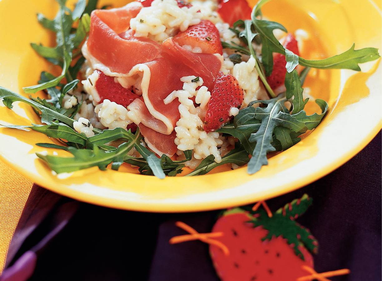 Kruidenrisotto met aardbeien en Parmaham