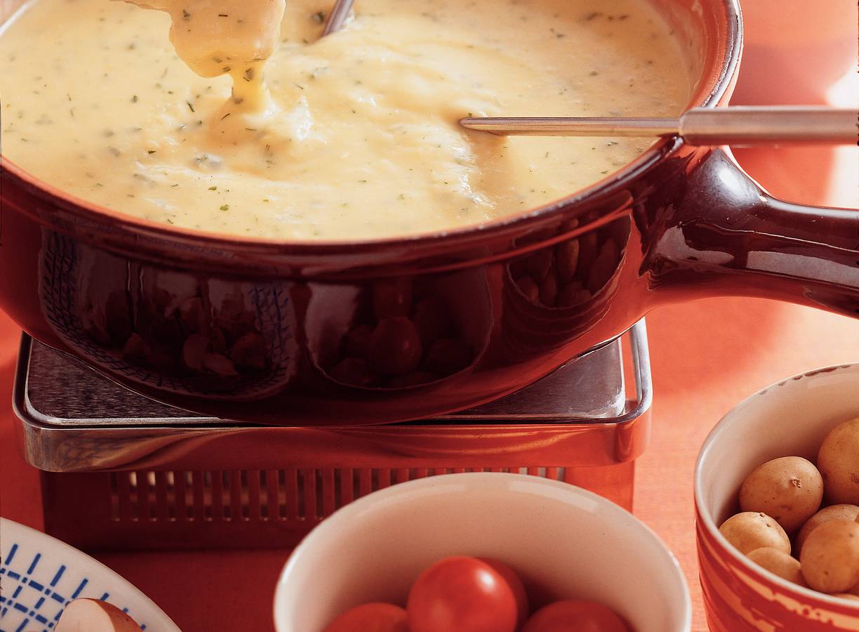 Kaasfondue met tuinkruiden en rauwkost