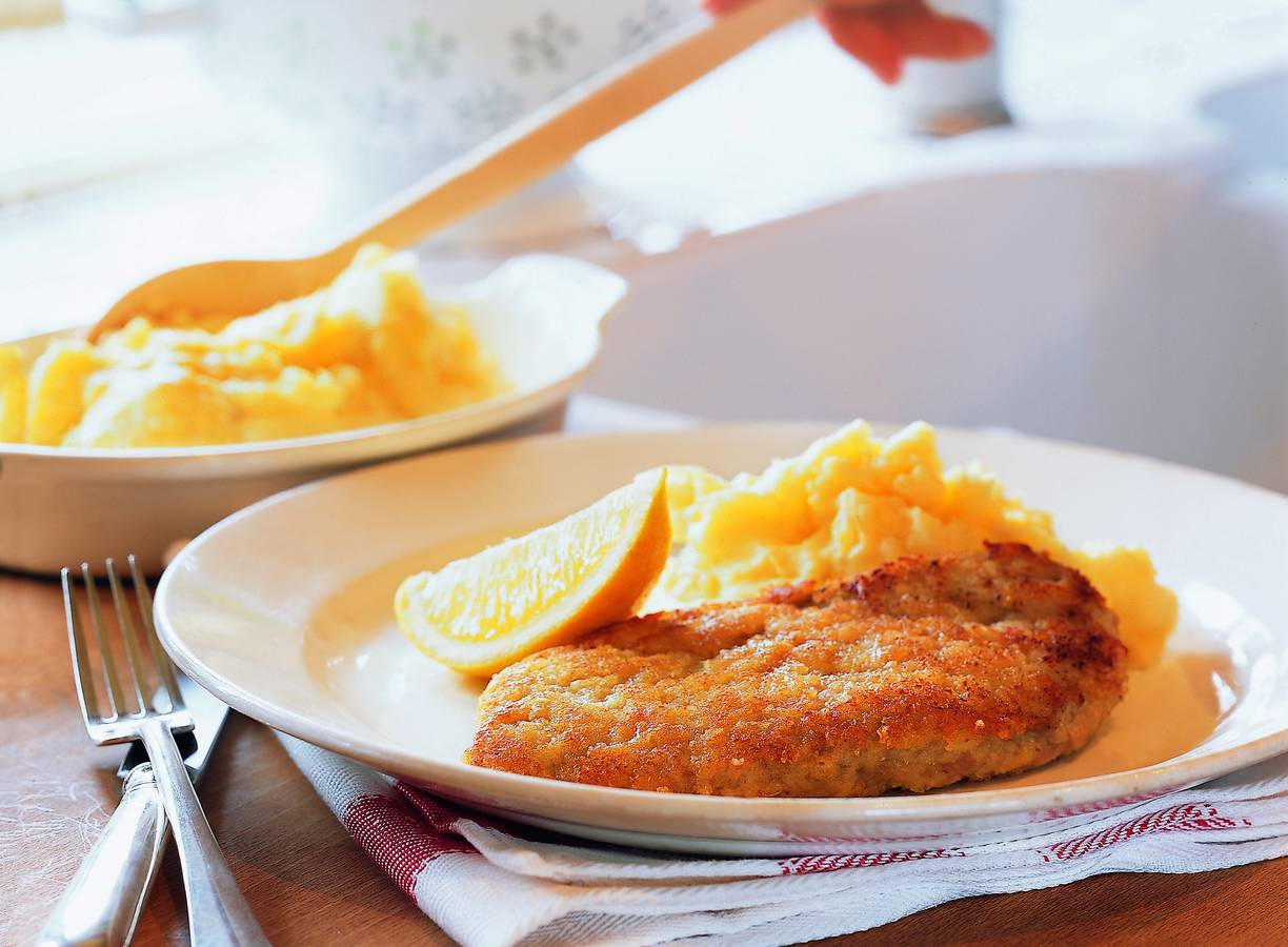 Kalfsschnitzels met een kaaskorstje