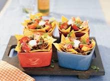 Zon, fris bier en deze Mexicaanse nachos met gehakt. Alle ingrediënten voor een ultieme zomerborrel. 