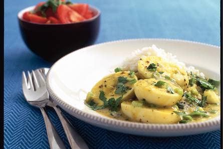 Eicurry met tomatensalade