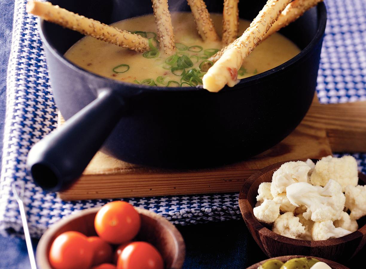 Fondue van cheddar en gruyèrekaas