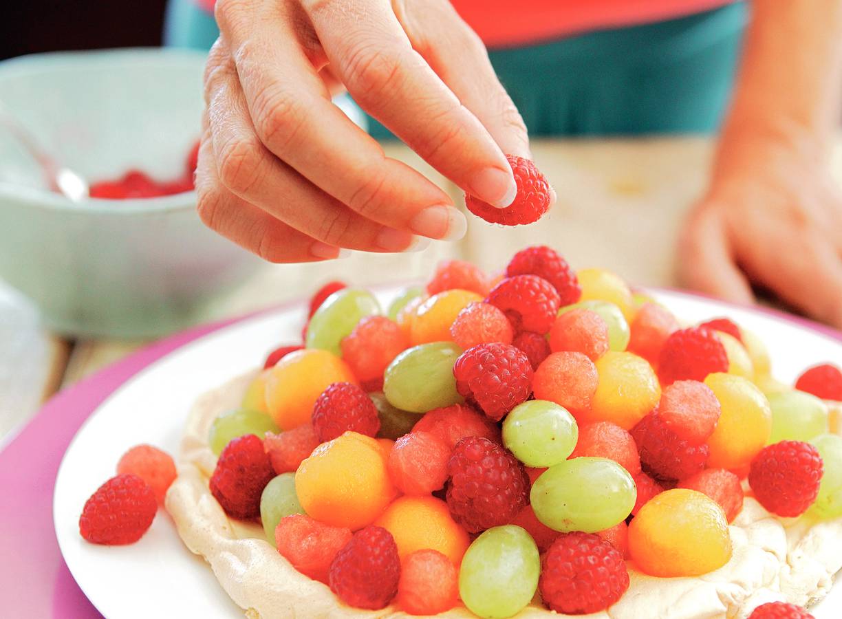 Meringue met meloen en frambozen