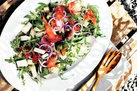 Salade van meloen, rucola en ham